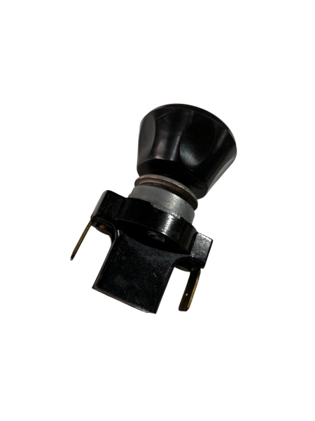 Schwarzer Schubschalter für die Innenbeleuchtung im Armaturenbrett eines VW Bus T2 (Baujahre 1968-1974).